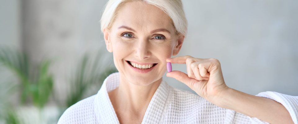 Woman Taking a Pill