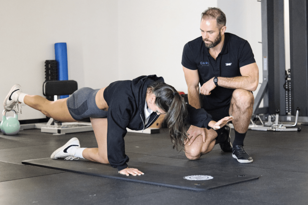 Girl training with a PT at Dare training studio